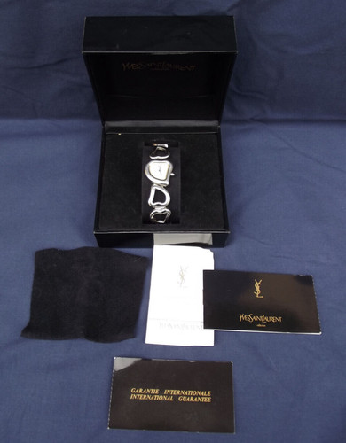 SAINT LAURENT (YSL) YSL Montre Yves Saint Laurent coeur en métal boîte papiers acheté à Cannes 1997