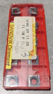 10 PLAQUETTES SANDVIK SCMX 09 T3 08 H13A NEUF - Foto 1 di 2