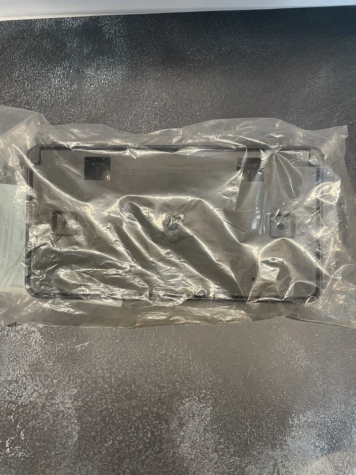 GENUINE MOPAR 04805866AA FRONT LICENCE PLATE HOLDER CHRYSLER 300 2005-2010. New - Image 1 of 3