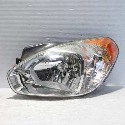 Conjunto de faros laterales izquierdo halógenos Hyundai Accent 2006-2011 OEM 92101-1E011 Foto 1 de 4