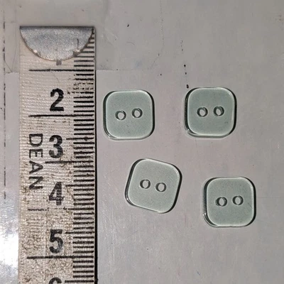 4 10mm Pale Green Clear Square 2 Hole Plastic Button - Image 1 of 2