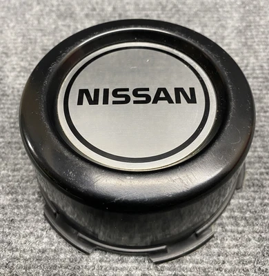 Llanta de acero Nissan Hardbody D21 Pathfinder 1987-1997 tapa central de plástico ¡OEM! Foto 1 de 4