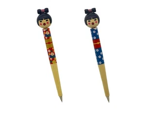 Traditional Japanese folk crafts Kokeshi doll ballpoint pens, set of 2 red and - Picture 1 of 7
