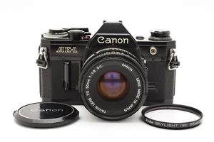 Canon AE-1 fotocamera reflex pellicola 35 mm con obiettivo #2485651 HTT 164-92-5 250530 - Foto 1 di 13