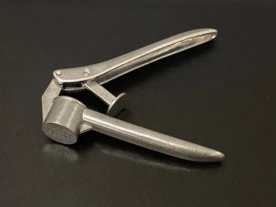 Prensa de mano de ajo Metal aluminio prensa gadget trituradora de ajo prensa de alimentos Foto 1 de 4