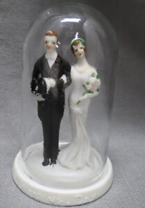 Vintage Porcelain Bride and Groom Cake Topper with glass dome