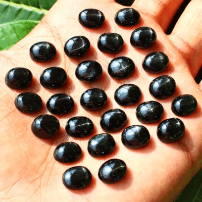 Lote de 16 piezas de piedras preciosas calibradas de 11x9 mm de cabujón ovalado de estrellas naturales Birmania Foto 1 de 4