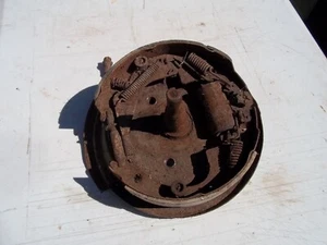 ORIGINAL GM FRONT DRUM BRAKE ASSEMBLY WITH SPINDLE AND BACKER DUST SHIELD PLATE - Picture 1 of 4