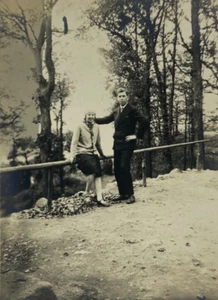 Woman Sitting On Fence Rail By Man With Hand On Her Neck Photo RPPC - Picture 1 of 3