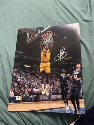 Foto firmada 11x14 por Iman Shumpert Cleveland Cavaliers campeón de la NBA con pegatina global Foto 1 de 2