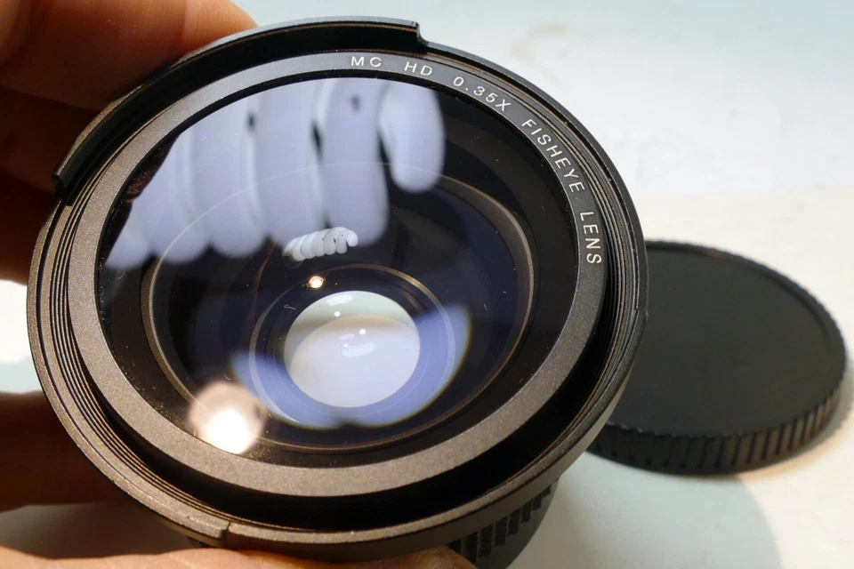 Lente MC HD 0,35X AUX Super Gran Angular Ojo de Pez 58 mm para 18-55 mm IS EF Foto 1 de 4