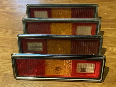 LENTES DE LUZ TRASERA CHEVY CHEVETTE 1976-79 *DOS JUEGOS* (4 piezas) con cromo (1 nuevo) Foto 1 de 4