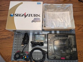 Sega Saturn Skeleton HST-0021, boxed, Action Replay, RGC Scart Cable - Tested