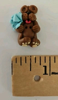 3-D DOG WITH BLUE BOW 2-Hole Polymer Clay Button Embellishment for Cross-Stitch  - Image 1 of 3