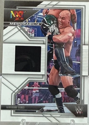 2022 Panini WWE NXT - Nxt Memorabilia Giovanni Vinci #NXM-FAB Red /99 (MEM, RC) - Image 1 of 2
