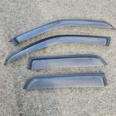 2002-2006 02-06 Honda CR-V PUERTA VISERAS PROTECTOR DE LLUVIA CON CLIPS VENTANA USADO OEM Foto 1 de 4