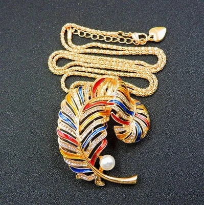 Betsey Johnson Necklace Multicolor Crystal Feather Brooch / Pendant Gold Tone - Image 1 of 3