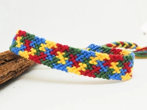 Da Polso Autismo Macramé Tessuto IN Fili Da Cotone Puzzle Fatto A Mano - Foto 1 di 3