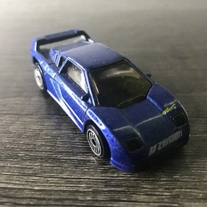 Vintage 1990 Hot Wheels #228 Zender Fact 4 Blue UH Wheels 1:64 - Picture 1 of 9