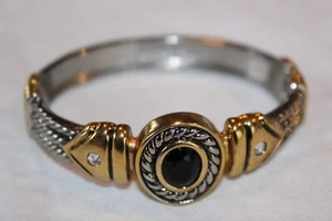 Neu ohne Etikett modisches Armband in Silber- und Goldtönen mit schwarzem Mittelstein und CZs - Bild 1 von 7