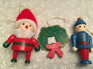 3 wooden ornaments. Soldier, wreath, Santa. Santa 4 inches with hat. - Picture 1 of 7