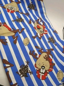 Tela de fútbol americano Looney Tunes Warner Bros Taz Tasmanian Devil 1994 2 yardas vintage - Imagen 1 de 7