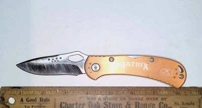 Cuchillo Buck USA 722 Spitfire Lockback hoja única mango dorado Foto 1 de 4