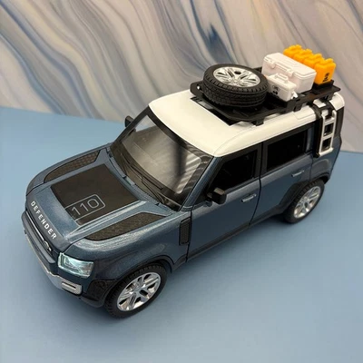 2020/2025 Land Rover Defender 110 — масштаб 1:24 — синий с коробкой - Изображение 1 из 4