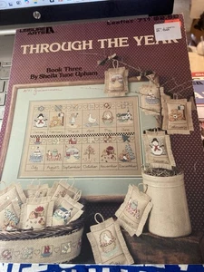 VTG Leisure Arts Leaflet #711 Through The Year Cross Stitch Charts Patterns 1988 - Picture 1 of 3