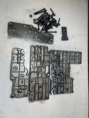 Ford E40D 1 lot Valve Bodies RF-E9TP-7A101-BD,RF-E8TP-7G393-CE,RF-E9TP-7A092-BD - Image 1 of 4