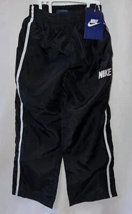 Nike Insulated Track Wind-pants Kids Youth Black Size 4 - Picture 1 of 6
