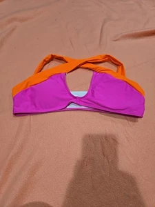Top bikini colorato con incrocio schiena Lg - Foto 1 di 3