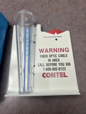 Pluviómetro de metal Contel publicidad vintage sin usar nuevo en caja Pella Ia Foto 1 de 3