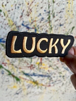 Lucky Iron On Patch Gold Black Embroidered - Image 1 of 2