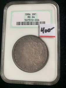 1886 $1 Silver Morgan Dollar NGC Graded MS 64 green holder Choice rainbow toning - Picture 1 of 4