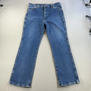 Pantalones de mezclilla Wrangler para hombre 36x30 azul corte vaquero calce ajustado lavado medio desgastados 937STR - Imagen 1 de 10