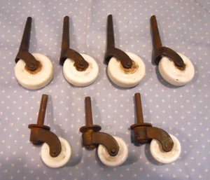Lot of 7 Vintage Porcelain Caster Wheels~ Steel Pin~ For Cabinet/ Dresser - Picture 1 of 8