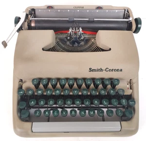 Macchina da scrivere vintage Smith Corona Clipper - manuale portatile in custodia - funziona benissimo! - Foto 1 di 16