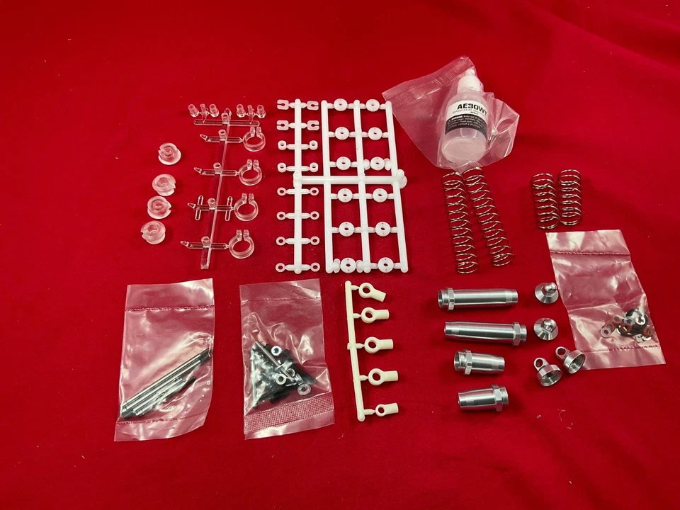 TEAM ASSOCIATED RC10cc CLEAR SILVER Shock Absorber Set  shocks FRONT REAR RC10 - Image 1 of 4
