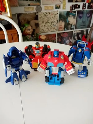 Playskool Heroes Transformers Rescue Bots Flip Racers Set of 4 Optimus Prime Etc - Image 1 of 4