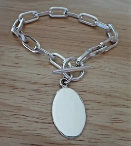 Brazalete con dijes ovalados de plata esterlina de 7" pesado 23 g cierre palanca - Imagen 1 de 3