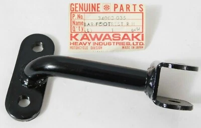1 reposapiés derecho genuino Kawasaki G4TR KV 100 1974-1976 NUEVO OEM 34003-035 Foto 1 de 3