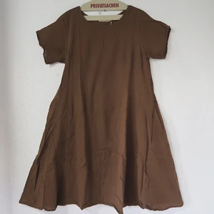 PRIVATSACHEN Kleid A-Linie Crinkel-BW TENTAKT 48-50-52 (3) 'mudcloth' braun - Bild 1 von 4