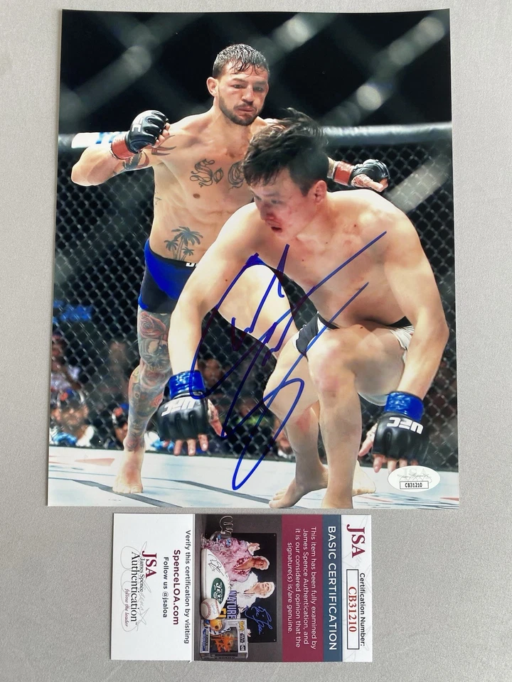 UFC STAR- CUB SWANSON AUTÓGRAFO 8x10 FOTO DE ACCIÓN DE LUCHA UFC/MMA JSA CB31210 Foto 1 de 1