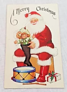Frohe Weihnachten Vintage Postkarte Weihnachtsmann Puppe Trommel - Bild 1 von 2