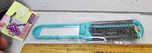 vintage Alaska Folding Brush, great for travel, folds w/ mirror in handle, teal - Picture 1 of 3