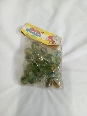 -*{ML86}Glass Cats Eye Marbles in Package Taped Shut Looks To Be All 30 - Image 1 of 4