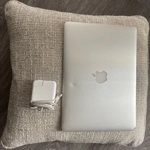 2014 MacBook Air in good condition, fully functional. Two minor dents. - Picture 1 of 10