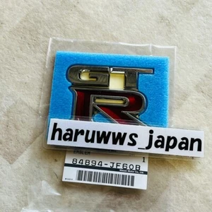 OEM Nissan 08-17 GT-R R35 Rear Bumper Emblem Badge 84894-JF60B GTR Genuine NEW - Picture 1 of 6
