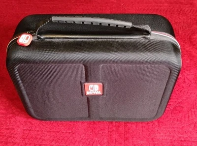 Official Nintendo Switch Game Travel System Storage Hard Shell Carry Case 12x9x5 - Image 1 of 4